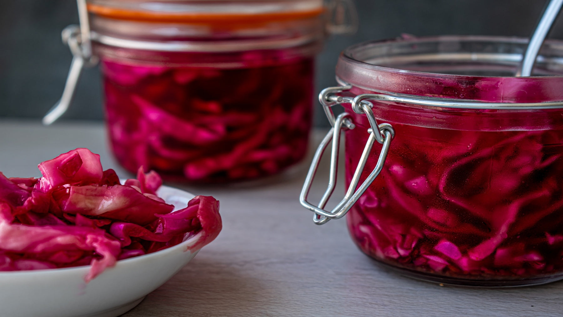 3 different bowls of fermented cabbage